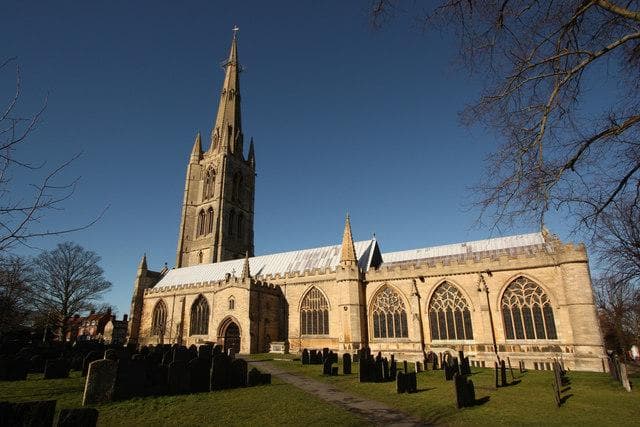 St Wulfram's Church spire rising over the rooftops of Grantham